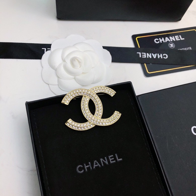 Ch*el brooches